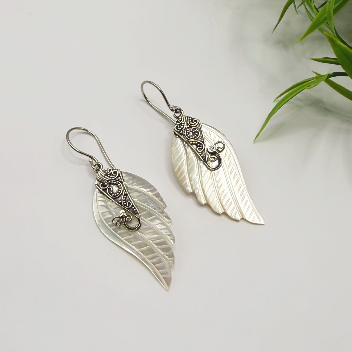 Asas de Madrepérola: A Elegância que Toca a Alma. - Imagem 2